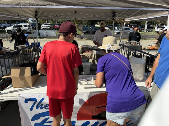 helping themselves with food